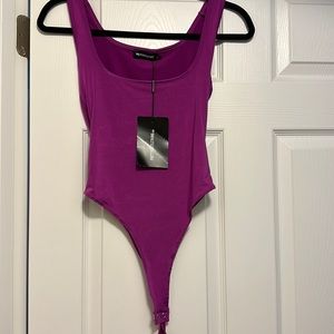 PLT bodysuit never worn